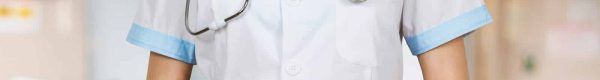 woman in white button up shirt and blue stethoscope