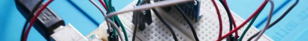 a close up of a board with wires attached to it